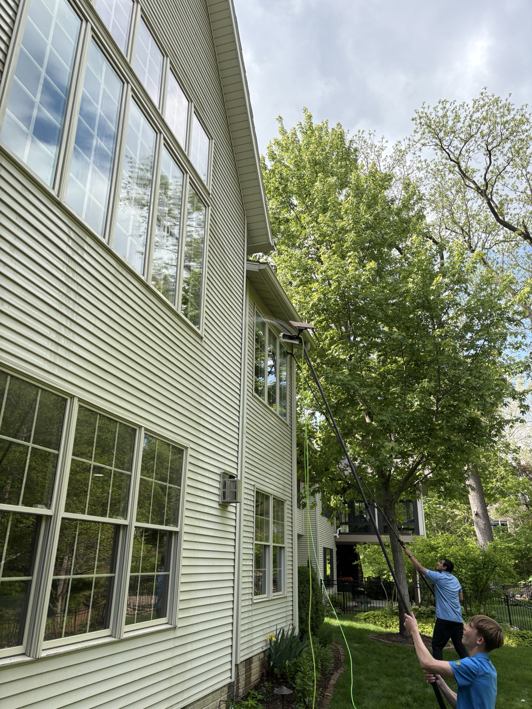 Bright Windows crew using pure water poles